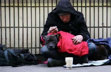 Homeless man with dog